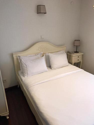 Letto o letti in una camera di Ferahi Evler Ayvalık