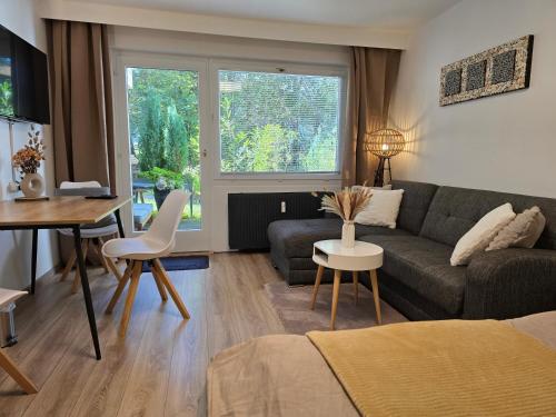 Posezení v ubytování Erholungs- Apartment am Kurpark & Therme Bad Urach