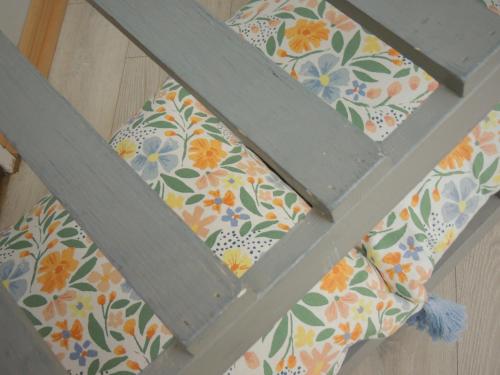 a set of stairs with a floral pattern on them at Barn Guesthouse in Kroonstad