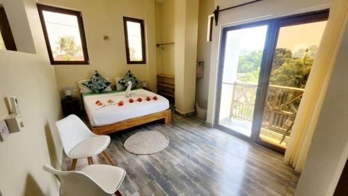 Ένα ή περισσότερα κρεβάτια σε δωμάτιο στο SuBanda Boutique Hotel