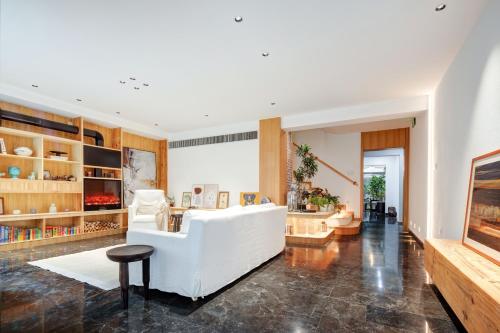 Postel nebo postele na pokoji v ubytování Xi'an Jasmine Boutique Inn