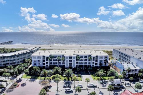 an aerial view of a hotel and the beach at Beachfront 3BDR Condo with Pool & Deck Ocean Views Ocean Blvd #102 by AvantStay in Isle of Palms