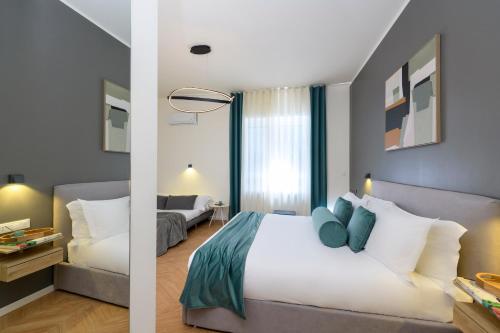 Cama o camas de una habitación en Tolu Relais