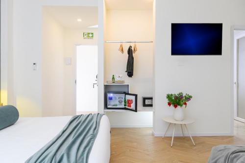 Una televisión o centro de entretenimiento en Tolu Relais