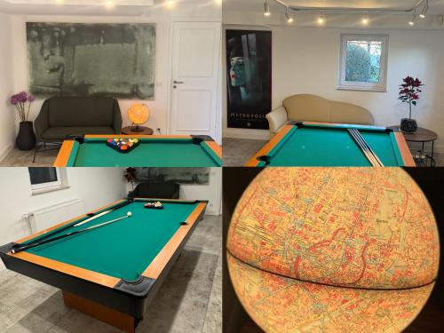 a room with a pool table and a map at Grand Villa Berg-Starnberg For Your Vacation, Retreat, Workshop, Corporate and Familys event in Berg am Starnberger See
