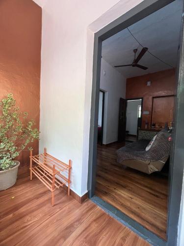 a view of a bedroom with a bed and a mirror at Dragster Pool Villa in Māla