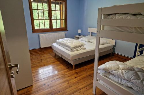 Gîte 3 étoiles jusqu'à 12 persにあるベッド
