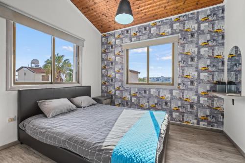 Postel nebo postele na pokoji v ubytování Demetris apartment