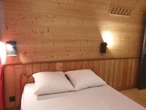 Postel nebo postele na pokoji v ubytování Appartements Le Clos des Gentianes