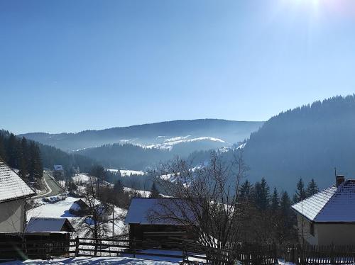a view of a mountain with snow on the ground at Sunčana strana in Nova Varoš