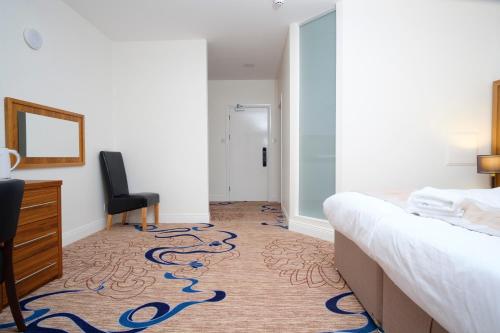 Kelpies Hotel Falkirkにあるベッド