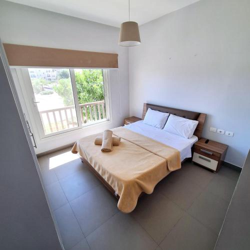 Ένα ή περισσότερα κρεβάτια σε δωμάτιο στο 2 Bedrooms First floor in Waterside Residence