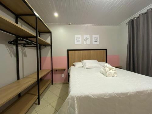 Katil atau katil-katil dalam bilik di Vila Orvália Hospedagem