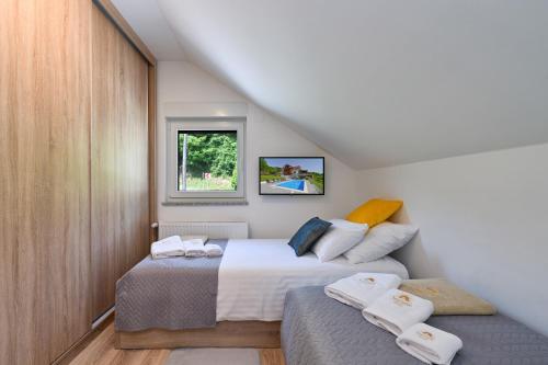 Posteľ alebo postele v izbe v ubytovaní Sunrise Hill