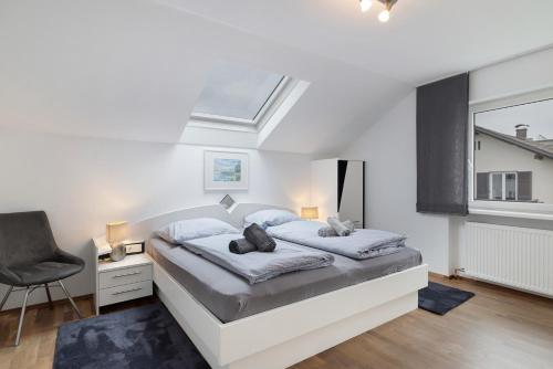 Postel nebo postele na pokoji v ubytování Ferienwohnung Rheintal Hard