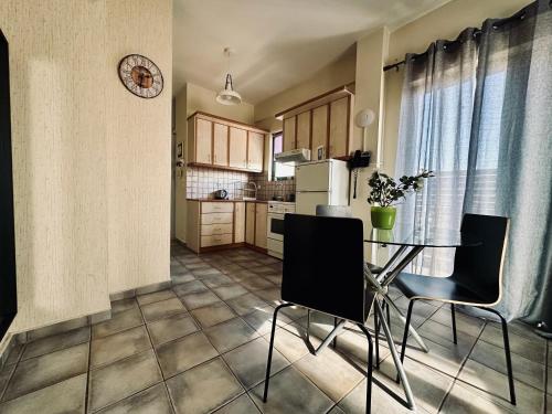 Kuchyňa alebo kuchynka v ubytovaní Cozy Apartments Mc Queen
