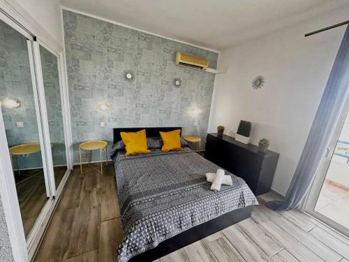 En eller flere senge i et værelse på Vista Paraiso 1209