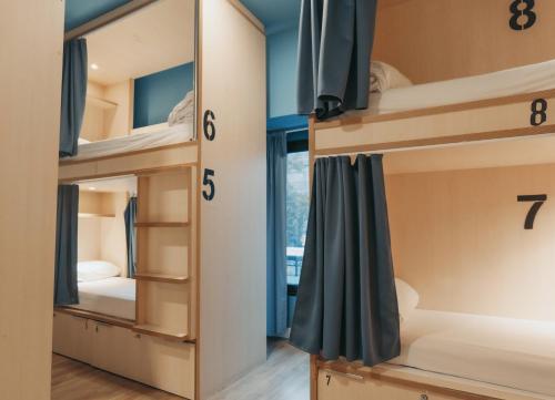 Postel nebo postele na pokoji v ubytování Mola Hostel