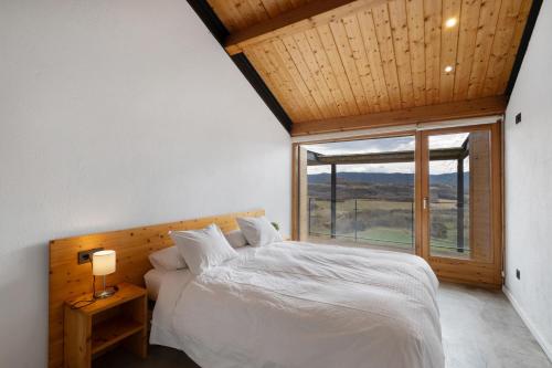 Postel nebo postele na pokoji v ubytování El Pujol