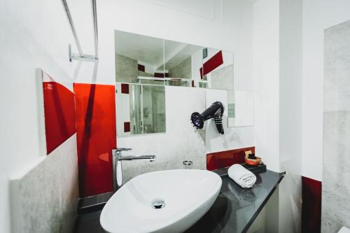 Ein Badezimmer in der Unterkunft Le Cave di Fontane Bianche