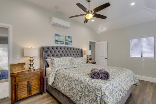 a bedroom with a bed and a ceiling fan at Destination #41 in Fullerton