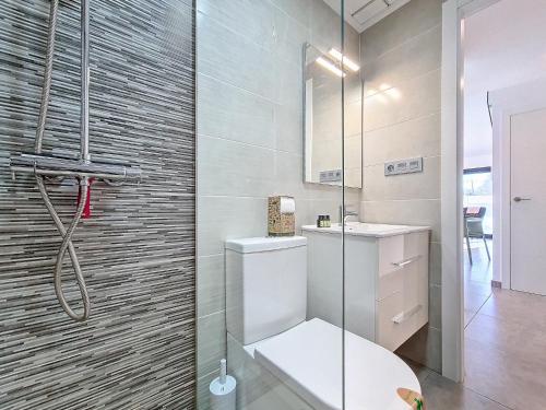 a bathroom with a toilet and a shower at San Pedro del Pinatar Villa - 5010 in San Pedro del Pinatar