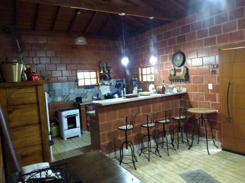 Küche/Küchenzeile in der Unterkunft Nosso cantinho, Pedaço do paraíso na Natureza
