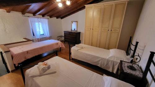 Ένα ή περισσότερα κρεβάτια σε δωμάτιο στο Casa Fornaci