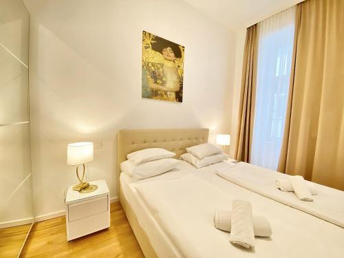 Posteľ alebo postele v izbe v ubytovaní Steiner Residences Vienna Taborstrasse