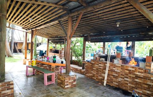 Kawasan patio atau luaran di Pousada Fazendinha Tatuira