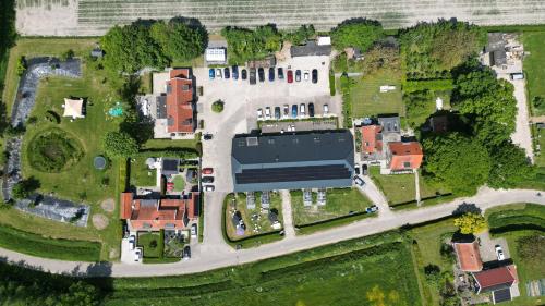 an overhead view of a house with a road at Hof Olmenstein in Goes