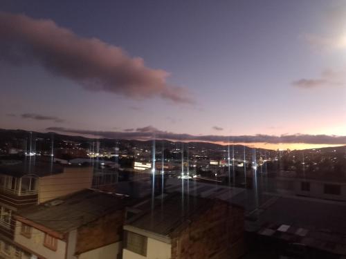 a view of a city at night at Apartamentos CasaMJ Tunja Confort y Parqueadero in Tunja