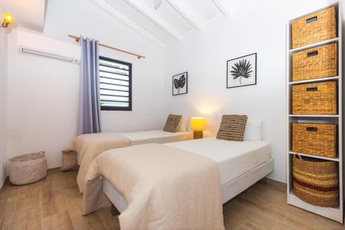a bedroom with two beds and a window at The views from the home were beautiful in Cul de Sac