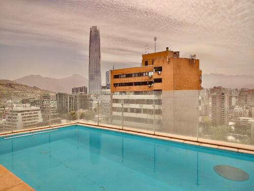 Πισίνα στο ή κοντά στο Luxury Providencia 305