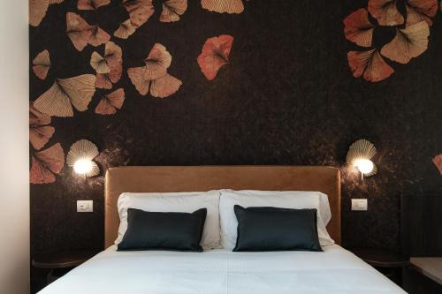 Una cama o camas en una habitación de Hotel Ristorante La Vignetta Cernobbio