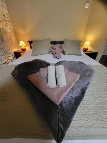 Postel nebo postele na pokoji v ubytování Le Relais des Eléphants Colorés