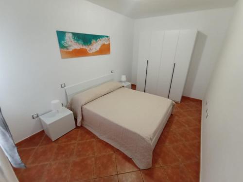 Ένα ή περισσότερα κρεβάτια σε δωμάτιο στο Sol Costa Arinaga