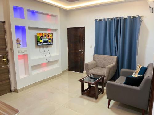 TV a/nebo společenská místnost v ubytování Souad Résidence