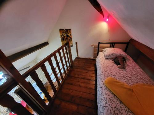 Postel nebo postele na pokoji v ubytování Le Relais des Eléphants Colorés