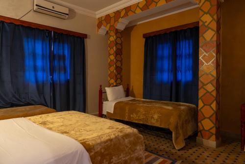 Postel nebo postele na pokoji v ubytování Hotel Marmar