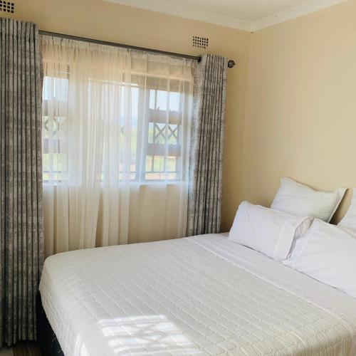 Ένα ή περισσότερα κρεβάτια σε δωμάτιο στο Framans Holiday Home