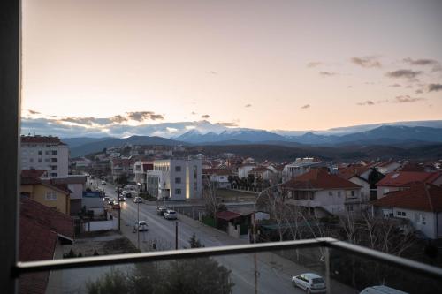 a view of a city with mountains in the background at Urban Living in Gevgelija