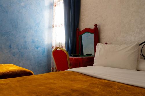 Ein Bett oder Betten in einem Zimmer der Unterkunft Hotel Marmar