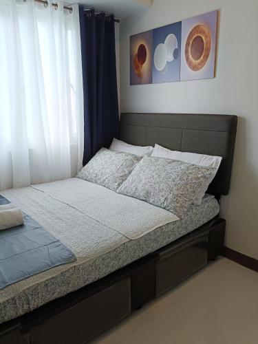 Cama o camas de una habitación en Coast Residences