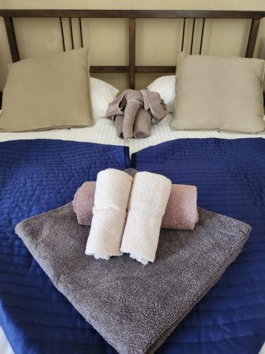 Postel nebo postele na pokoji v ubytování Le Relais des Eléphants Colorés