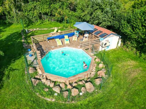 Bazén v ubytování Le Relais des Eléphants Colorés nebo v jeho okolí