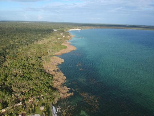 an aerial view of a large body of water at Eco Bañitas Tulum in Tulum