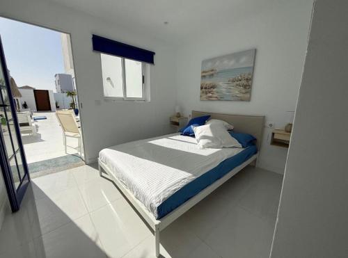 Postel nebo postele na pokoji v ubytování Habitación 13 ROOM