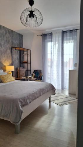 Ένα ή περισσότερα κρεβάτια σε δωμάτιο στο Apartments Teo 1