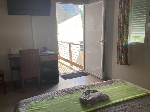 Ένα ή περισσότερα κρεβάτια σε δωμάτιο στο Bungalow Sea Brise 2 personnes